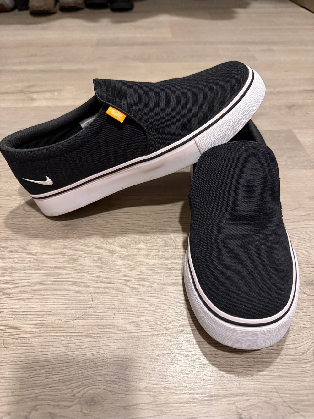 Nike Black Slip-On Canvas Sneakers with White Sole